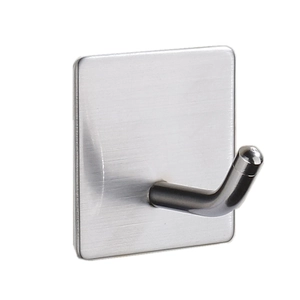 Detailed macro view of silver brushed stainless steel adhesive hook with L-shape design