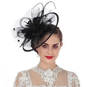 Detail view of a black vintage bridal fascinator with elegant mesh and feathers