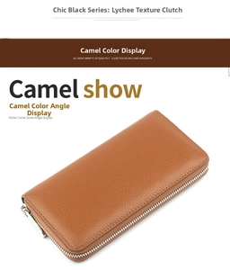 Macro detail of camel pebble grain leather texture on long zip wallet with silver zipper