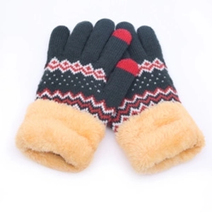Close-up of winter knit gloves with faux fur cuffs and red touchscreen fingertips