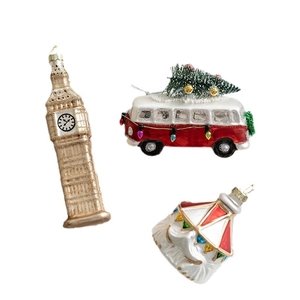 Christmas glass ornaments set including Big Ben, vintage red bus, and Santa pendant