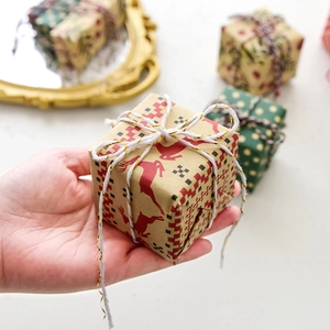 Mini Christmas gift boxes with reindeer and polka dot patterns for holiday tree decoration