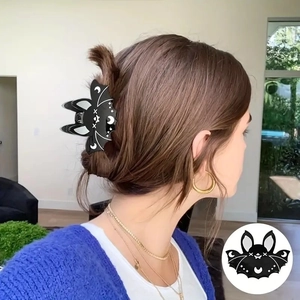 Gothic bat hair claw clip with moon and star patterns for Halloween hair styling