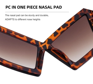 Detailed macro view of the integrated PC nasal pad on tortoiseshell cat eye sunglasses