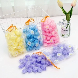 Laundry scent booster beads in colorful daisy bags with floral softener fragrance