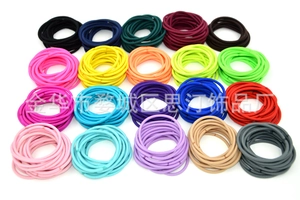 Macro view of 20 colors high elastic seamless hair ties set with woven texture