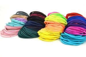 Close-up of seamless 3mm high elasticity hair ties in diverse vibrant candy colors