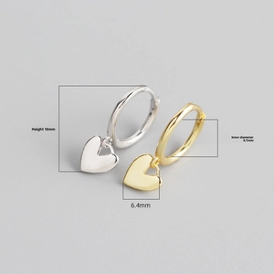 Detail of silver and gold heart hoop earrings with 18mm height and 8.5mm inner diameter