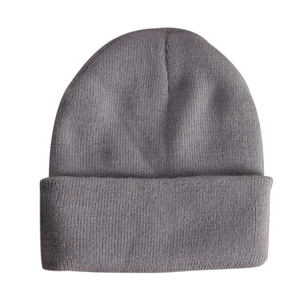 Detailed close-up showing the soft grey knitted texture and fold-over cuff of the wool beanie