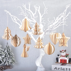 3D wooden DIY Christmas ornaments featuring stars and trees hanging on white branches