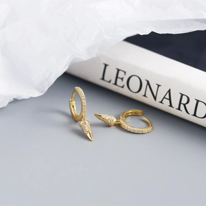 Detailed close-up of S925 sterling silver cone hoop earrings with sparkling zircons
