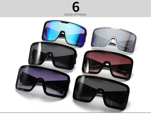 Detailed flat lay of oversized shield sunglasses in six diverse gradient lens colors
