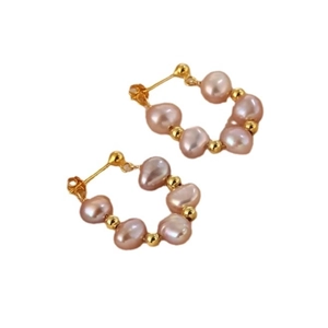 Baroque irregular purple pearl earrings with gold bead accents on a white background
