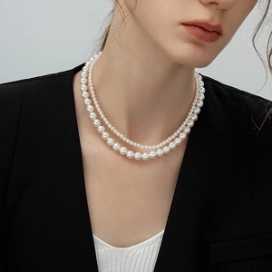 Elegant double-layered white pearl necklace for women featuring high-luster round beads