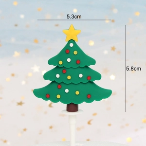 Detail view of a green Christmas tree cake topper with dimensions of 5.3cm by 5.8cm