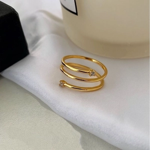 Elegant 925 sterling silver triple-layer spiral ring with zircon on white silk