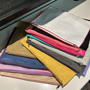 Ultralight colorful nylon organizer pouches with metal zippers in various vibrant colors