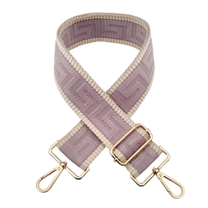 Detail of 5cm wide jacquard maze bag strap in lavender with gold metal hardware