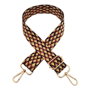 Close-up of a 3.8cm adjustable colorful woven shoulder strap with gold metal buckles