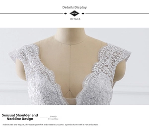 Detail of white fishtail wedding dress with lace embroidery and sequins on bodice