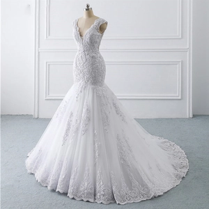 Elegant white mermaid wedding dress with deep V-neck, lace embroidery and sequins