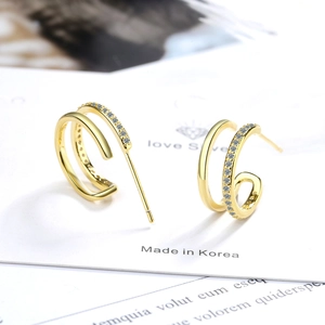 Minimalist gold C-shaped double hoop earrings with paved cubic zirconia on white card