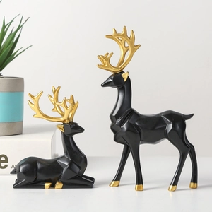 Modern Nordic resin deer figurines in black and gold finish for home decor