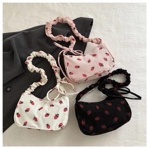 Chic corduroy drawstring strawberry print underarm bag in pink, white, and black colors
