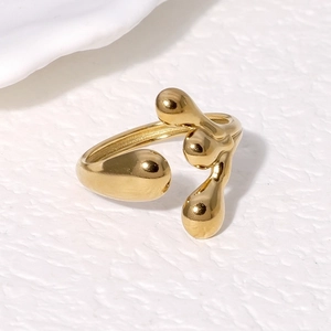 Modern irregular streamlined gold plated open ring with a minimalist artistic design