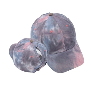Detail of tie-dye ponytail baseball cap featuring unique rear opening and breathable fabric
