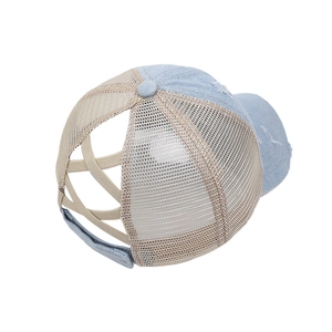 Light blue distressed denim and beige mesh ponytail baseball cap with criss-cross back