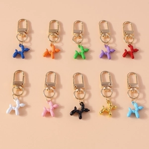 Set of 10 colorful balloon dog keychains with gold metal clips for backpack charms