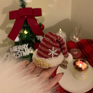 Knitted red and white striped Christmas hat hair clip with Merry Christmas text