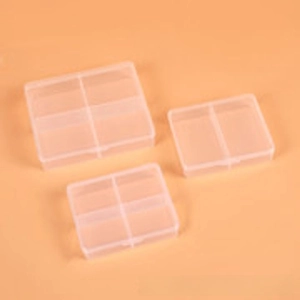 Detailed view of 2-slot and 4-slot transparent PP plastic storage boxes for small parts