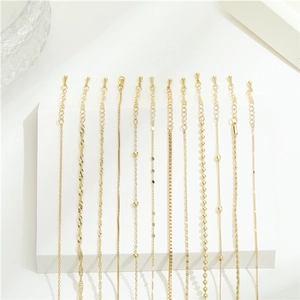 Collection of minimalist gold necklaces in various styles for jewelry DIY and accessory use