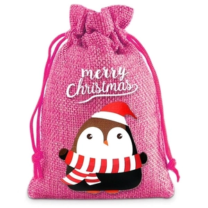 Pink burlap Christmas drawstring bag with a cute penguin and Merry Christmas text print