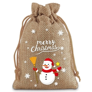 Detailed close-up of burlap drawstring gift bag with snowman and Merry Christmas print