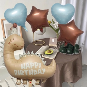 Cute dinosaur balloon set with heart and star shapes for jungle themed birthday party decor