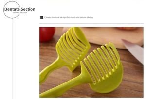 Close-up of bright green tomato slicer tool on a wooden countertop with red tomatoes