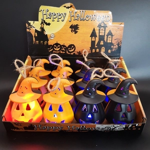 Detail of LED Halloween lantern with pumpkin witch hat design and hemp rope hanger