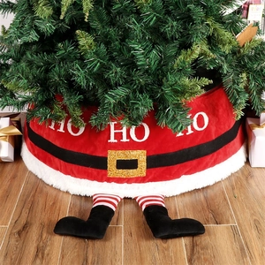Festive red velvet Christmas tree skirt with plush white trim and Santa Claus legs