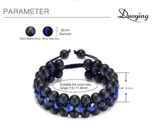 Detail showing 8mm black matte onyx and blue tiger eye stone beads on a woven bracelet