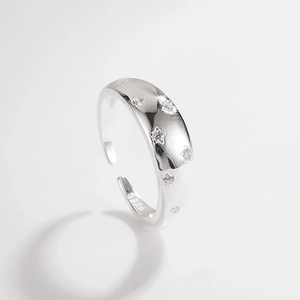 Detailed macro of S925 sterling silver stamp on minimalist star ring with cubic zirconia