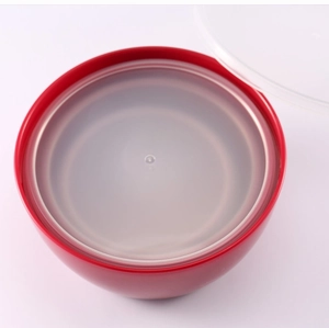 Close-up of a red round plastic food container with a clear lid for fresh storage