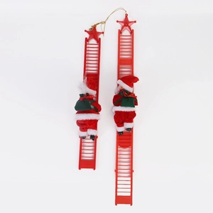 Detail view of two musical climbing Santa figurines with ladders for Christmas decor