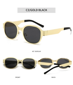 Detail view of vintage gold metal frame sunglasses with black lenses and smooth hinges