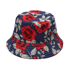 Women's reversible bucket hat featuring a vintage red rose floral print on navy blue fabric