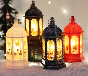 Close-up of assorted LED Christmas lanterns featuring Santa and reindeer holiday designs