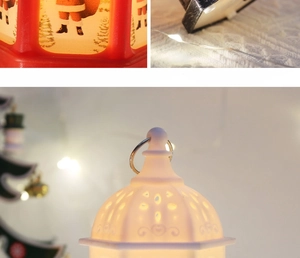 Detail of Christmas LED lantern showing Santa patterns, hanging ring and inner warm light