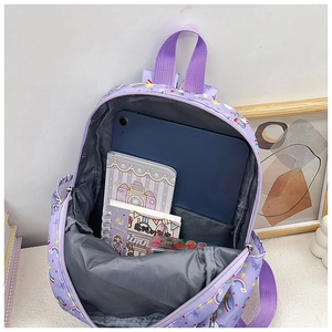 Internal view of purple unicorn kid backpack with dedicated tablet sleeve and pockets